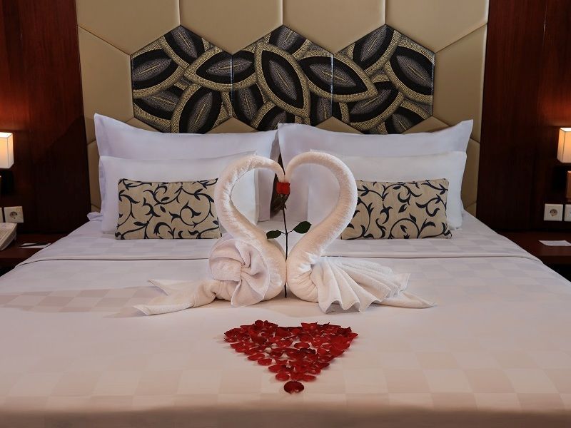 A Small Touch of Bali Hospitality - Towel Craft on the Bed.